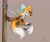 Size: 2048x1707 | Tagged: safe, artist:cyngawolf, miles "tails" prower, sails, sonic prime, brown background, chest fluff, eyelashes, fingerless gloves, gender swap, headscarf, holding something, looking offscreen, mouth open, salute, signature, simple background, smile, solo, sword