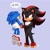 Size: 828x828 | Tagged: safe, artist:solar socks, shadow the hedgehog, sonic the hedgehog, hedgehog, black fur, blue fur, dialogue, english text, gloves, green eyes, male, movie style, red eyes, red fur, shoes, socks