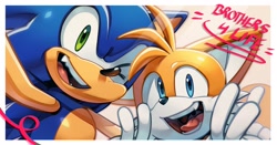 Size: 2048x1076 | Tagged: safe, artist:thatbirdguy_, miles "tails" prower, sonic the hedgehog, 2024, double v sign, duo, english text, mouth open, selfie, smile, v sign, wink